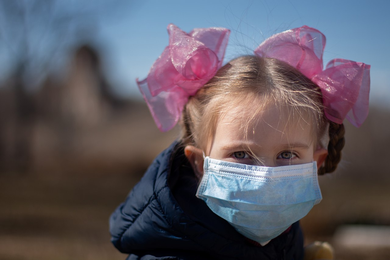 A child in a medical mask during a coronavirus pandemic